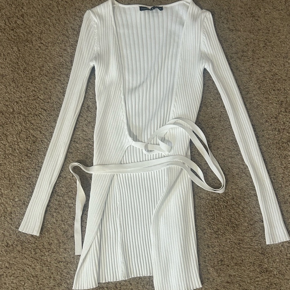 A 2 piece Naked Wardrobe super thick material. Size small.